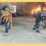 Así sacaron a un niño del lugar donde se quemó una buseta en Santa Marta,las llamas estaban quemando otro vehículo